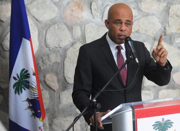 Michel Martelly exprime son impatience de revenir en Haïti